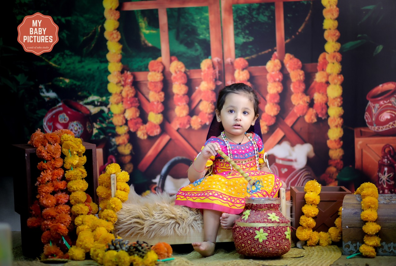Professional baby photoshoot in Delhi with a Vrindavan theme